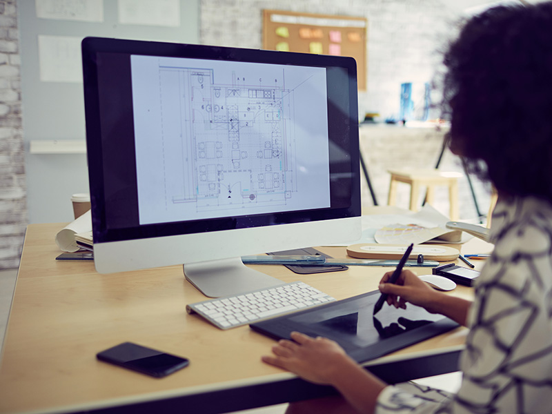 woman space planning on computer