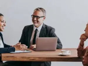 Businesspeople meeting and smiling